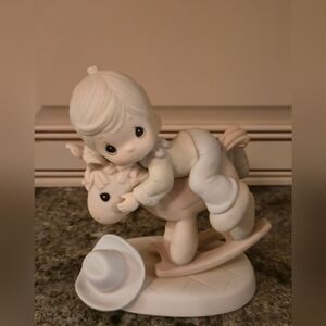 Precious Moments White and Cream Figurine